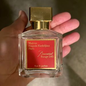 Empty bottle of Baccarat Rouge 540